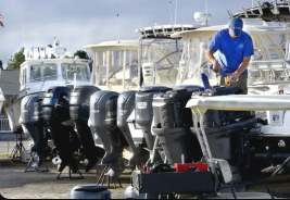 Technician performing detailed maintenance on yacht diesel engine systems