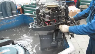 Yacht engine service team reviewing propulsion maintenance checklist